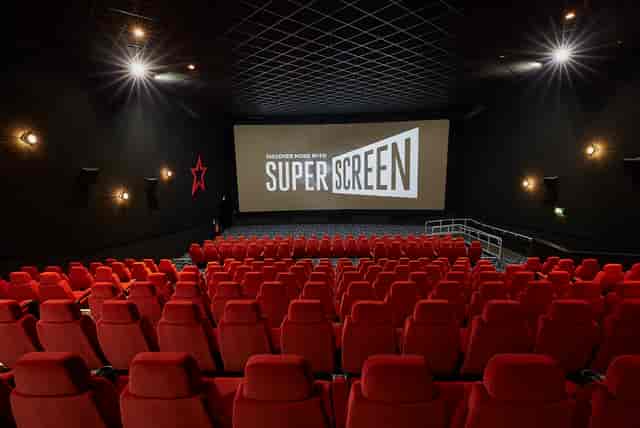 Cineworld Birmingham auditorium with plush red seating for film screenings and events.