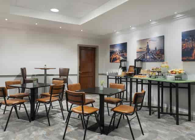 Victoria Room at Delta Hotels Liverpool, modern meeting space for networking events.
