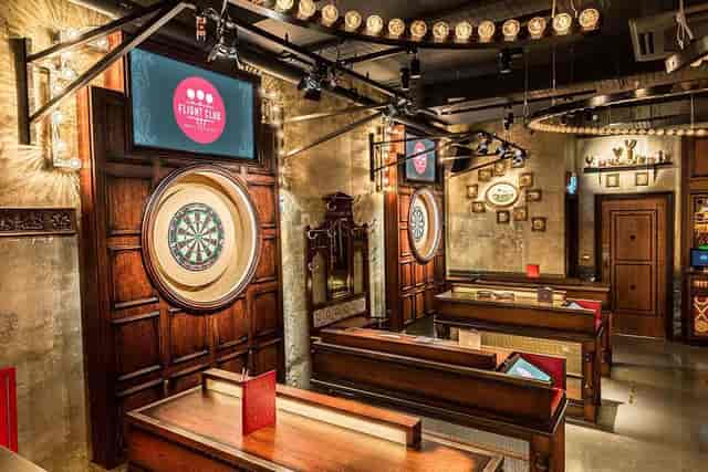 Stylish event space with vintage decor for corporate gatherings and team-building activities.