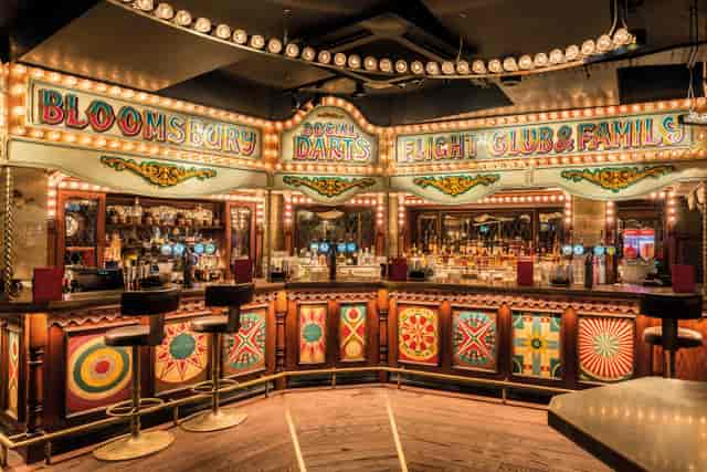 Vibrant Carousel Bar in Flight Club Bloomsbury, perfect for themed parties and events.
