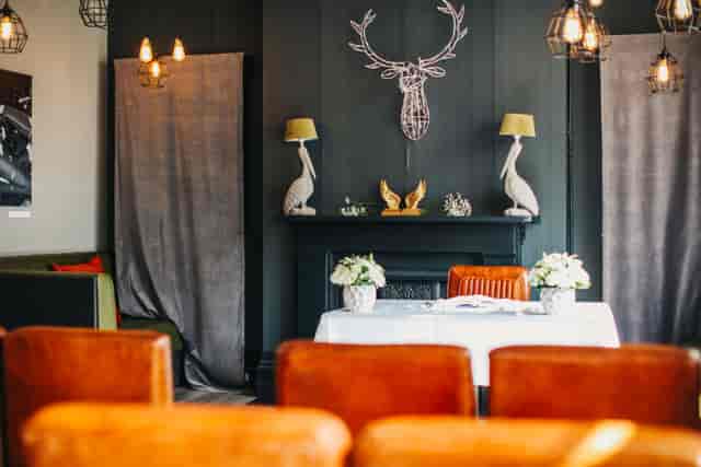 Stylish meeting space at Great Guns Social with elegant decor for creative gatherings.