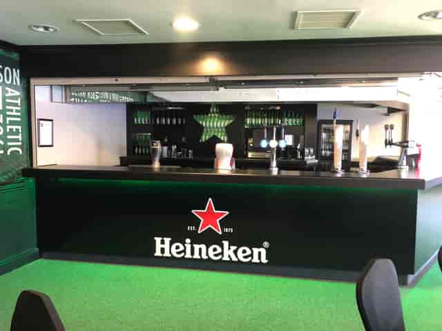 Modern bar at The Carling Lounge, DW Stadium, ideal for events and networking.