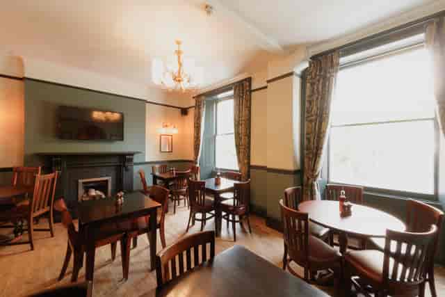 The Perseverance dining room: cozy pub setting for team meetings and networking events.