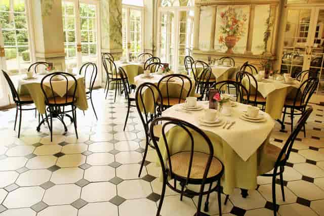 Elegant dining space in The Orangery, ideal for intimate gatherings and afternoon teas.