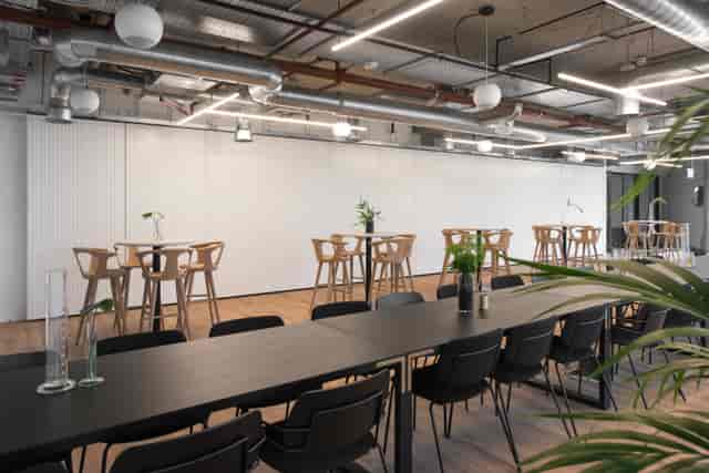 "Camden House Zone 1 event space with natural light for networking and meetings."