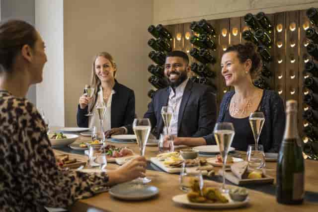 Networking event in upscale St Pancras Brasserie with elegant table settings.
