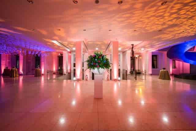 Atrium at Wellcome Collection with elegant lighting, perfect for upscale events and dining.