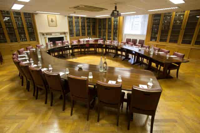 Marcus Beck Library conference room with oval table, ideal for executive meetings.