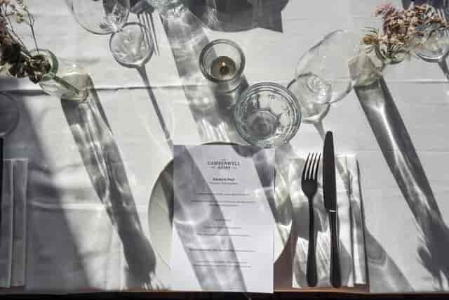 Elegant dining table setup at The Upstairs Room, perfect for events and meetings.