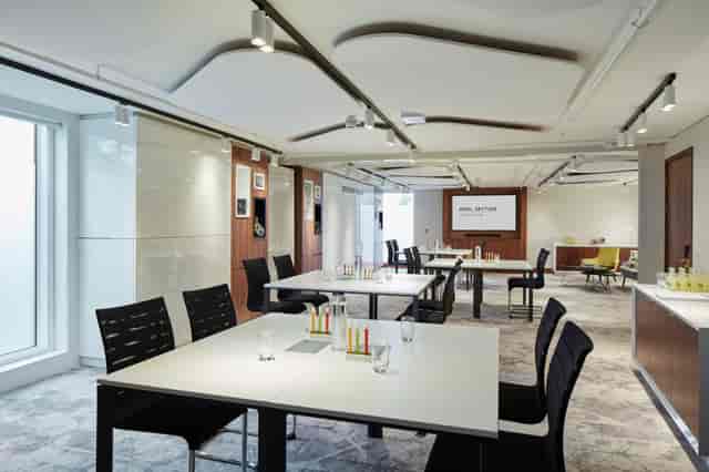 Modern Orville Suite at London Heathrow Marriott, ideal for corporate meetings and workshops.