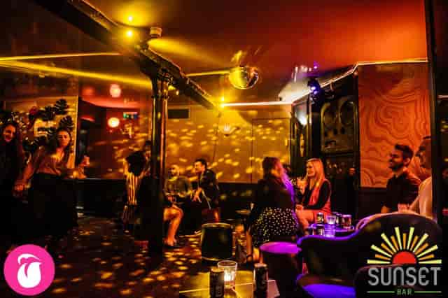 Vibrant event space with dynamic lighting for social gatherings and networking.