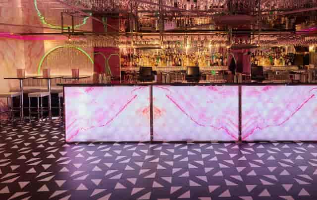 Vibrant bar area at Tonight Josephine Shoreditch, ideal for upscale cocktail events.