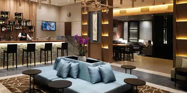 Modern meeting room in Plaza Premium Lounge, ideal for networking and events.