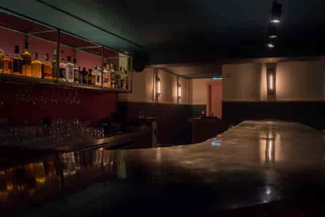 Sleek modern bar at Fanny's, perfect for cocktail receptions and networking events.