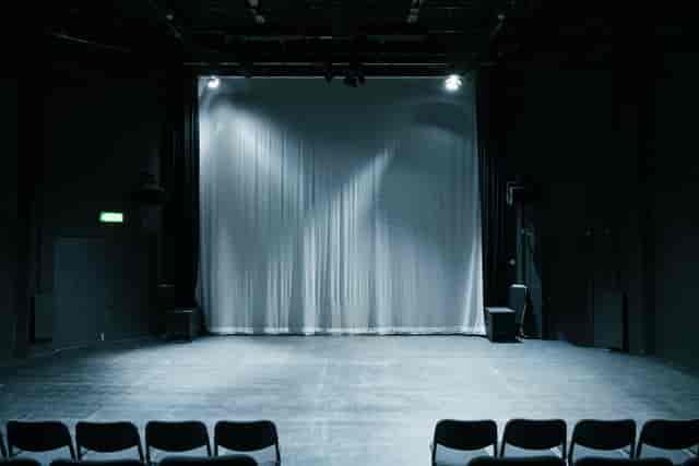 Versatile stage setup in Contact Theatre for presentations and performances.