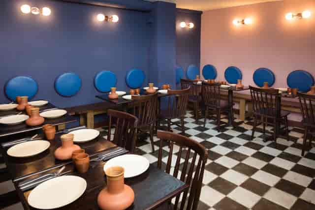 Intimate dining area in Little Kolkata, ideal for private events and gatherings.