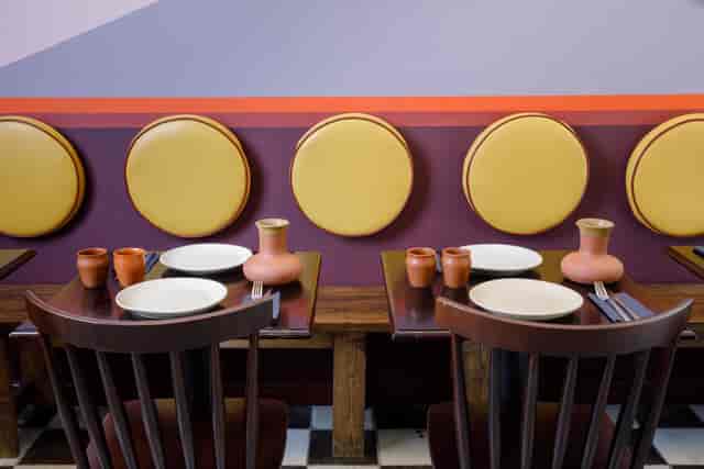 Vibrant dining setup in Little Kolkata, perfect for intimate gatherings and cultural events.