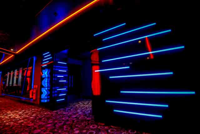 IMAX screen 1 at Cineworld Watford with vibrant blue and orange lighting for events.