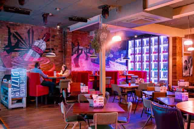 Vibrant venue hire in Revolution Leicester for casual meetings and social events.