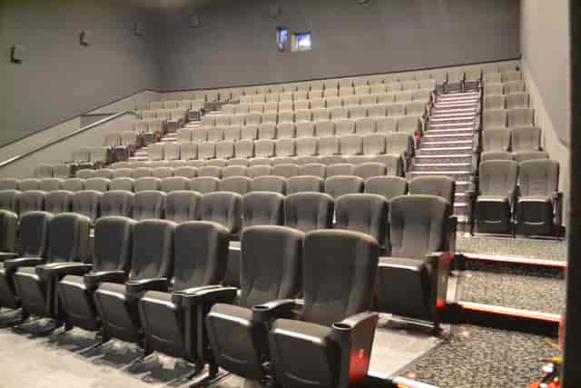 Cineworld Wembley Screen 5 auditorium with tiered seating for conferences and film events.