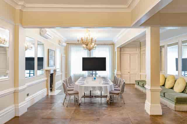 Richmond Room at Richmond Harbour Hotel, elegant meeting space with natural light.