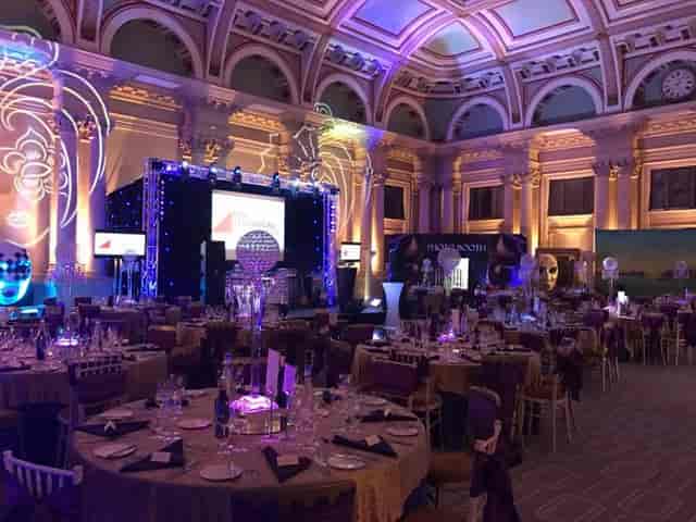 Elegant event space at Bristol Harbour Hotel with round tables for corporate dinners.