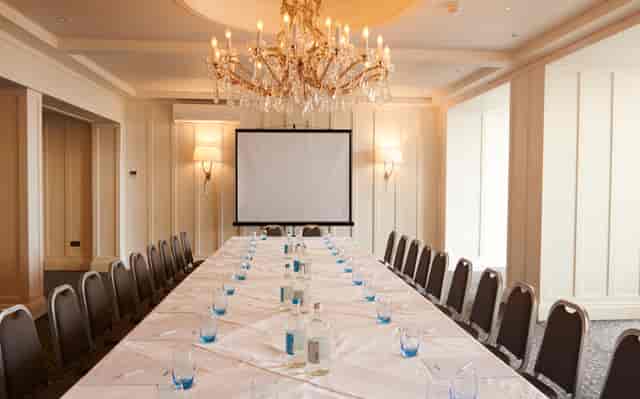 Connaught Suite meeting room with elegant table setup for corporate events in Sidmouth.