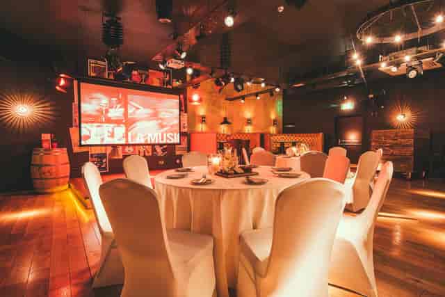 Casa De La Musica Nottingham event space with elegant tables, ideal for corporate meetings.