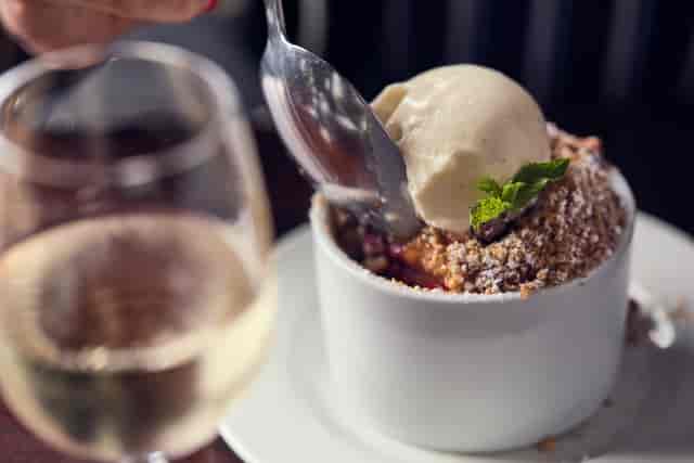 Elegant dessert with crumble and ice cream at Crusting Pipe, Covent Garden event dining.