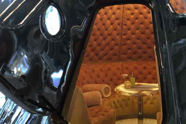 Stylish meeting space with plush seating at Bread Street Kitchen, ideal for upscale events.