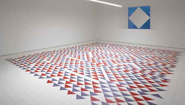 Albers Room: geometric red, white, and blue floor for creative workshops and events.