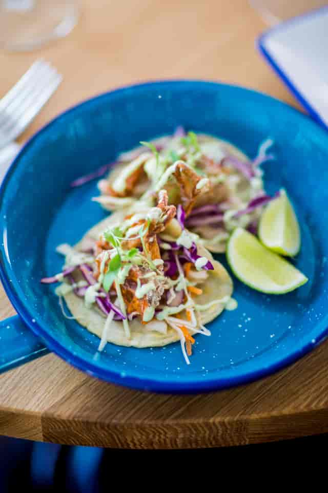 Vibrant tacos with colorful toppings at Agave Dining Room, perfect for events and catering.