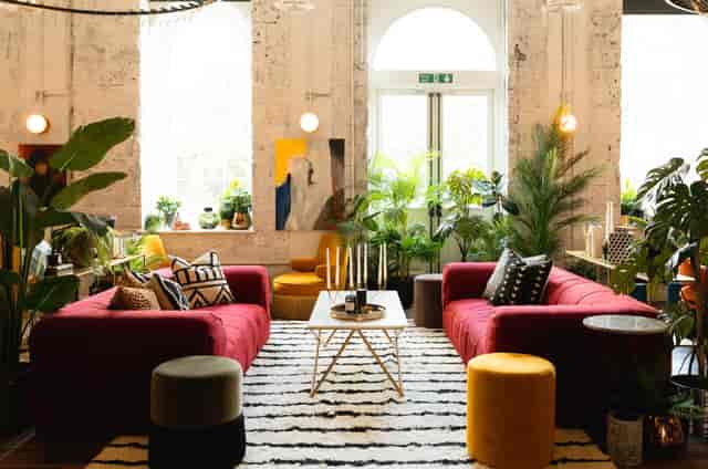 Vibrant lounge area in The Hall, ideal for networking events with stylish decor.