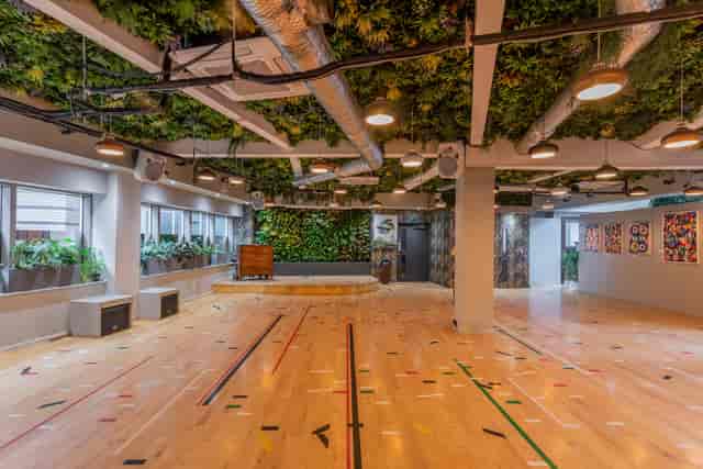 Main Lounge in Library with green ceiling for creative events and workshops.