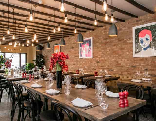 Wilfred's Lounge in Mayfair: cozy restaurant with elegant decor for events and gatherings.