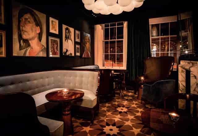 Stylish Anthracite venue with warm lighting for intimate gatherings and networking events.