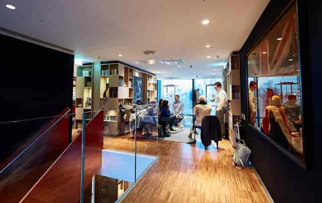 Modern open-concept meeting space in cloudM Tower, London for collaboration and networking.