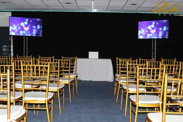 Elegant Silver Suite with gold chairs for corporate meetings and formal events.