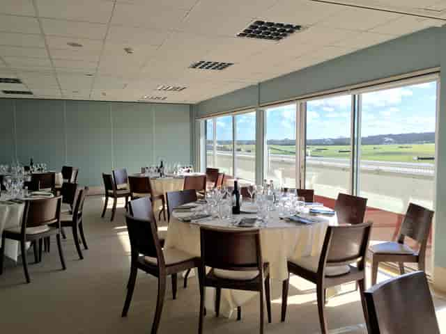 Berkshire Stand event space with elegant tables, ideal for corporate meetings and gatherings.
