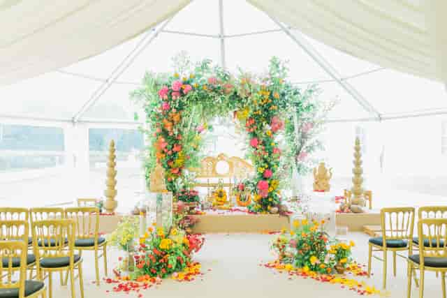 Floral arch in South Lawns, The Queen's House for elegant wedding celebrations.