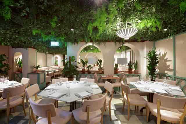 Elegant Garden Room at Kanishka Mayfair, perfect for upscale events and intimate gatherings.