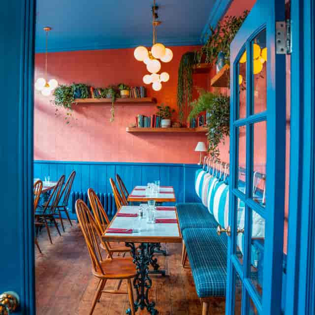 Private dining room at The Belrose, cozy decor for intimate gatherings and events.