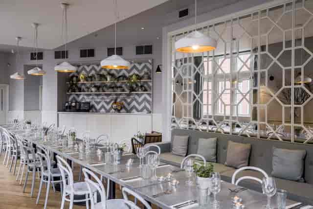 Private dining room at No.11 Pimlico Road, modern decor for events and gatherings.