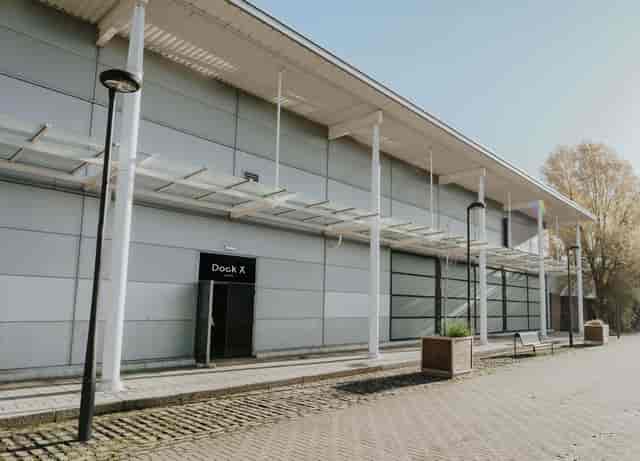 Modern Dock X London venue with glass doors, perfect for corporate events and exhibitions.