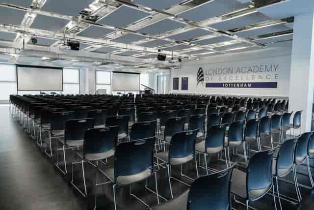Spacious conference room at London Academy of Excellence for corporate events and workshops.