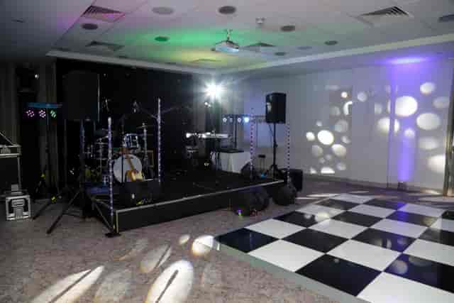 Claremont Suite at DoubleTree London: elegant event space with checkered dance floor.