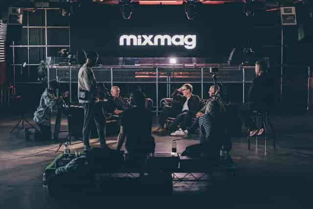 Dynamic brainstorming session in creative event space with relaxed seating for collaboration.
