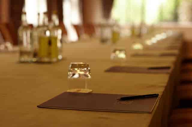 Laura Stafford in a well-prepared meeting room at Ashdown Park Hotel, ideal for events.