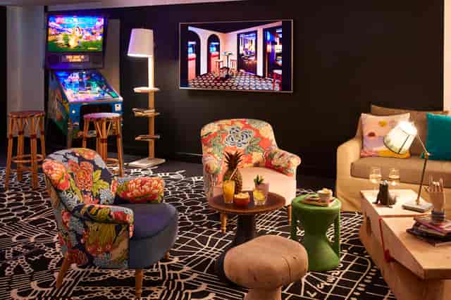 Vibrant lounge area in Atelier 1, Mama Shelter London for networking events and gatherings.