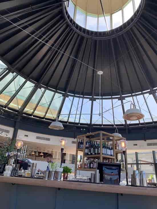 Stylish Mezzanine venue with glass dome ceiling for corporate events and social celebrations.
